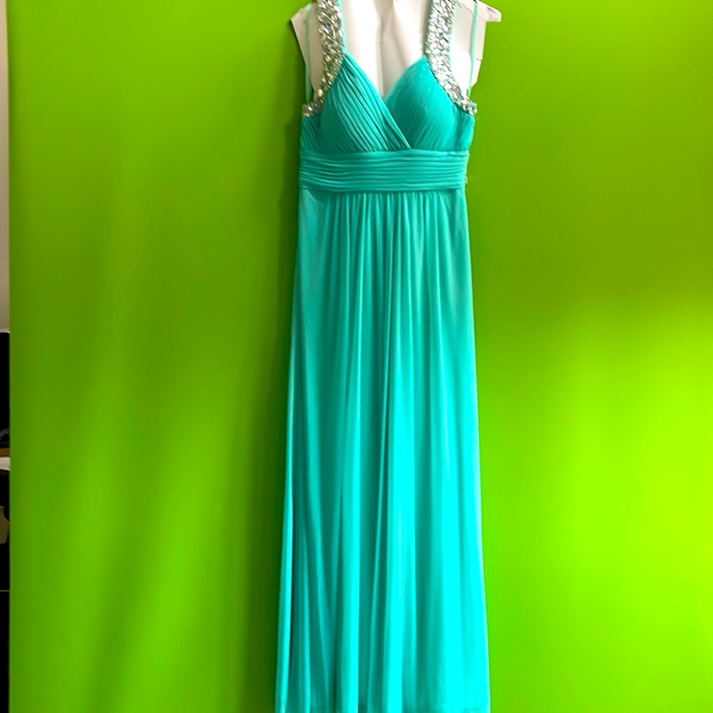 Beautiful dress with rhinestones on the sleeve
